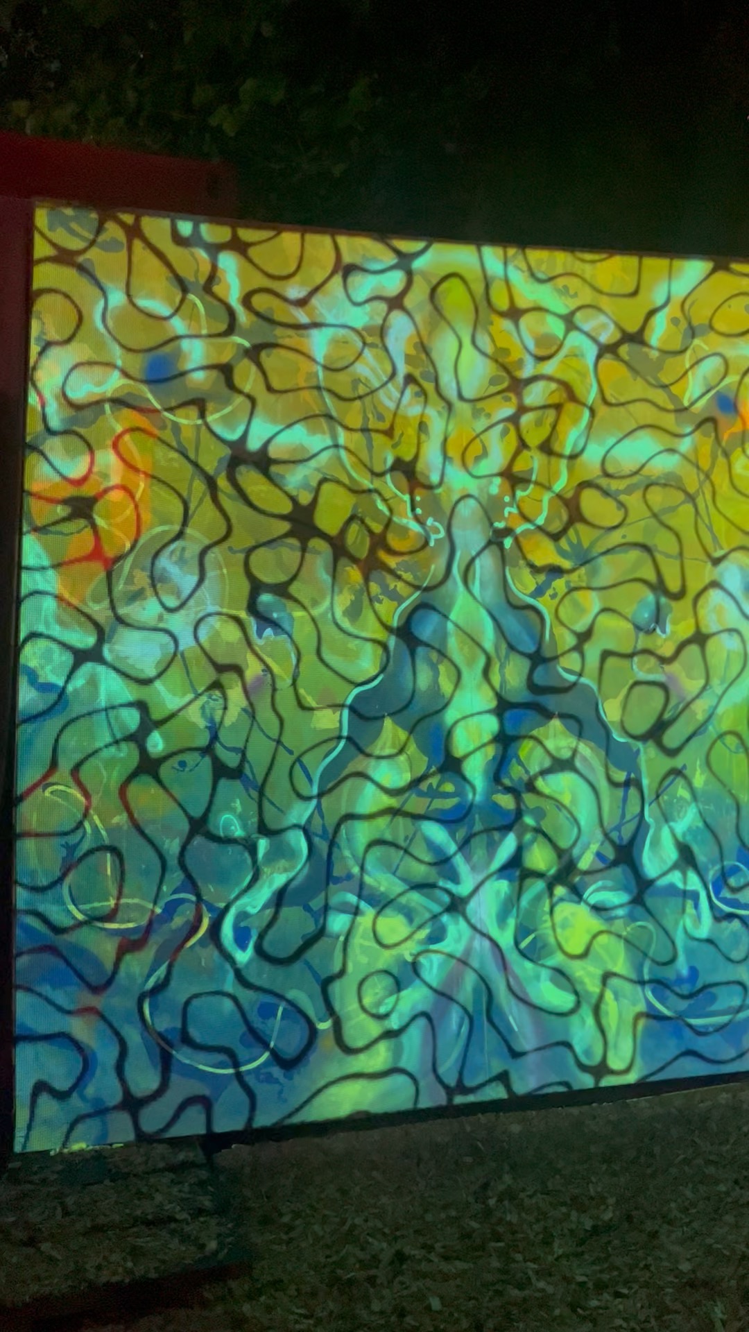 Projection light transforms Livia’s mirrored painting